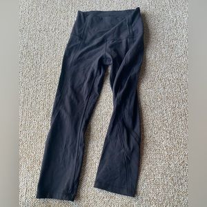 Thick cropped lulu leggings with keyhole cut outs along leg